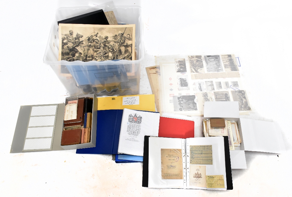 A large collection of military ephemera including war time bank notes, WWI postcards, extensive