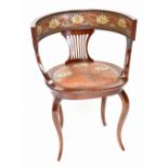 An early 20th century mahogany bow back chair, with Art Nouveau embossed leather back and seat on
