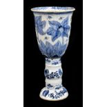 A Chinese blue and white porcelain goblet, probably 18th century, with floral decoration on a single