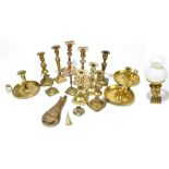 A quantity of assorted metalware including a pair of silver plated candlesticks, assorted brass