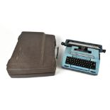 A Smith-Corona Coronet XL 'Coronamatic' typewriter in blue, cased.
