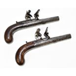 A pair of 18th century flintlock pocket pistols, with 2.5" screw-off barrels, the action stamped