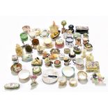 A collection of small enamel boxes and toy sized ceramics including a limited edition enamel box