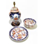 A modern Chinese porcelain vase shaped lamp, together with a matching Imari bowl and charger,