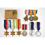 A Royal Navy WWI trio, WWII medal group of four, a George VI Long Service and Good Conduct and