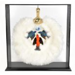 A Native American turkey feather fan with embroidered birch bark handle and mounted with three birds