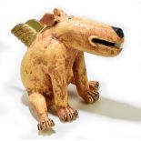 A contemporary pottery model of a seated dog with wings, numbered OKRZ-Q63, height 34cm.