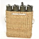 A set of four wicker cased Swiss military artillery cases, one bearing label and numbered 591-276,