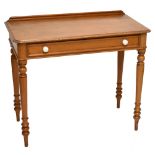 A 19th century waxed pine side table with single drawer on turned supports to peg feet, height 79cm,