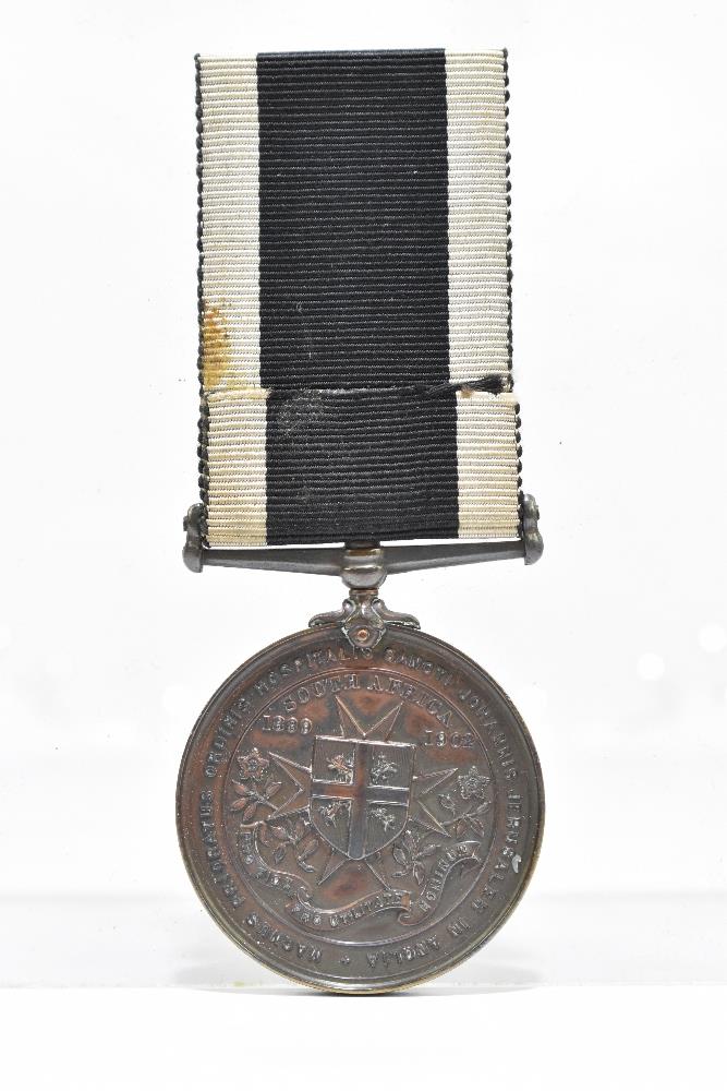 An Edward VII St John's Ambulance South Africa 1899-1902 Medal with impressed naming for 1027 Pte. - Image 2 of 5