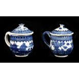 Two 18th century Chinese Export porcelain lidded jus pots, the each decorated with a landscape