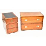 A reproduction mahogany brass bound campaign style chest of two drawers raised on block feet,