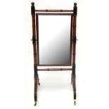 An early 19th century mahogany cheval mirror of small size, height 130cm, width 59cm, plate measures