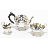 HENRY MATTHEWS; an Edward VII hallmarked silver three-piece bachelor service, with cast scrolling