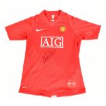 CRISTIANO RONALDO; a Nike Manchester United 2008 season child’s home shirt signed to front, size