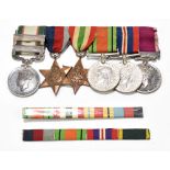 A medal group of six comprising George VI Regular Army Long Service and Good Conduct Medal, India