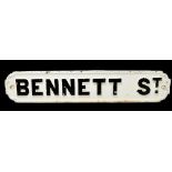BENNETT ST; a cast iron street sign, height 72cm.Additional InformationGeneral wear around the edges