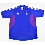 ZINEDINE ZIDANE; an Adidas France home shirt signed and no. 10 to reverse, no size stated.