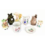 A group of ceramics including a 19th century Staffordshire frog mug (af), a cow creamer jug, a