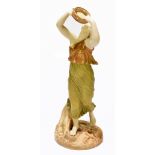 ROYAL WORCESTER; a bisque porcelain figure, female Bacchante with tambourine, gilt heightened,