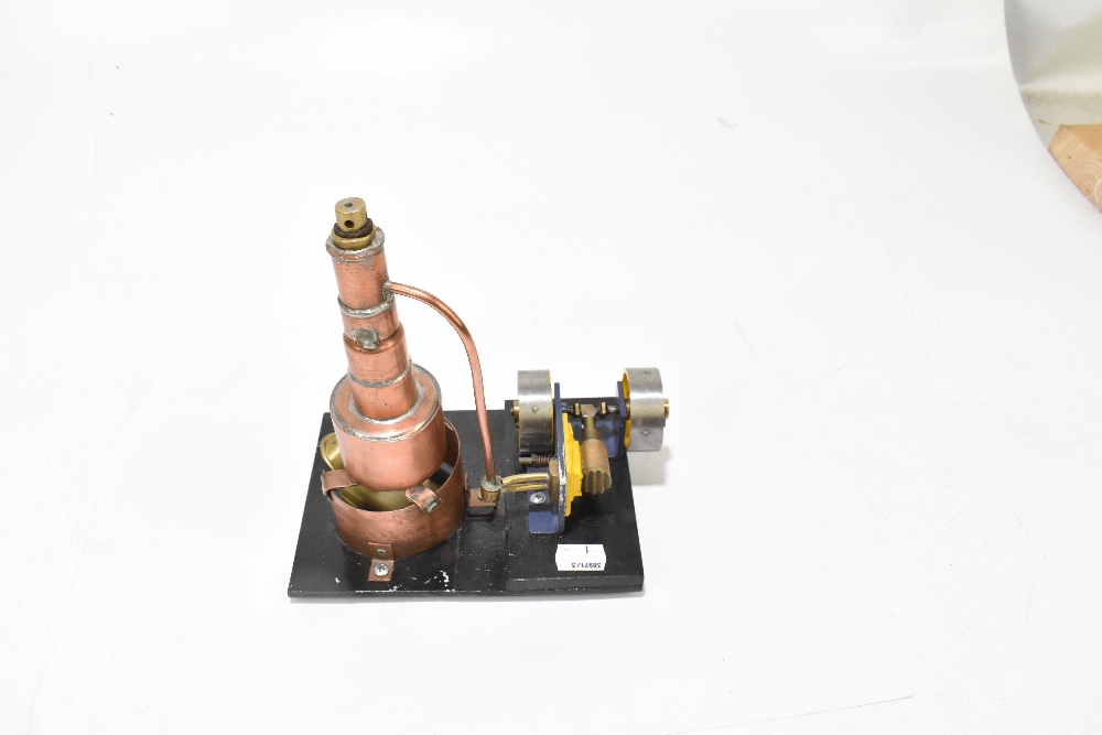 A contemporary scratch built steam engine, with copper chimney, raised on a black painted wooden - Image 3 of 4