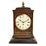 An early 19th century mahogany and brass inset bracket clock with fusée movement, the case with