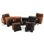 Six pairs of binoculars comprising a pair of Ross of London Solaross 9x35 binoculars, a pair of