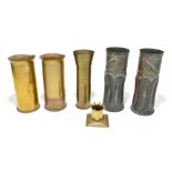 TRENCH ART; five assorted shell casing's including a pair of examples decorated with birds perching,