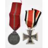 A WWII German Third Reich Iron Cross and East Front Medal (2).Additional InformationWear and rubbing