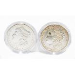 Two US 1921 Morgan dollars, one San Francisco Mint, both encapsulated and boxed (2).