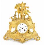 HENRY MARC OF PARIS; a late 19th century French gilt metal mantel clock bearing surmount modelled as