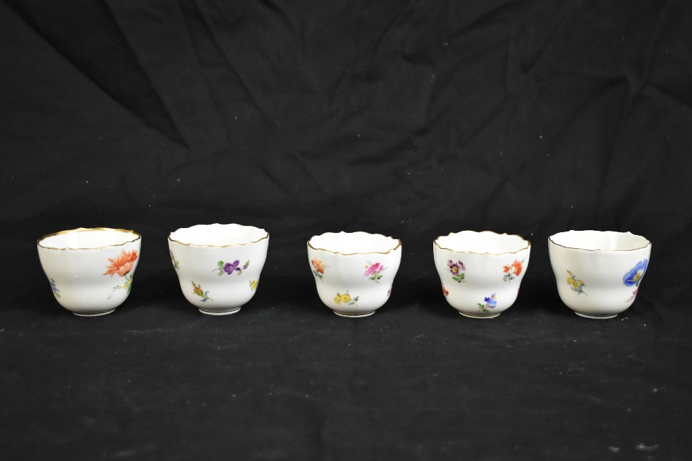 MEISSEN; a harlequin set of five porcelain cups and saucers, each decorated with floral sprigs under - Image 4 of 16