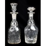 A 19th century cut glass decanter, height 23cm, together with a later example (2).