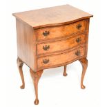 A Queen Ann style walnut serpentine chest, with three drawers, on shell carved cabriole legs, height