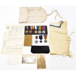 A WWII group of five including War and Defence Medals, 1939-1945 Africa and Atlantic Stars awarded