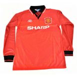 ERIC CANTONA; an Umbro Manchester United 1994-96 seasons retro reproduction home shirt signed
