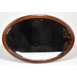 An early 20th century mahogany framed mirror with inlaid detail and bevelled plate, 55 x 80cm.