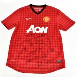 MANCHESTER UNITED; a Nike 2013 home shirt signed by De Gea, Rooney, Ferdinand, Berbatov, Giggs,