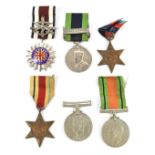 A group of medals awarded to 3522417 Pte. G. Sturgess Manchester Regiment comprising George V