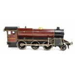 An early to mid-20th century clockwork locomotive, numbered 13000, impressed patent pending,