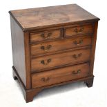 A George III style mahogany chest of small proportions, with short and three graduated long drawers,