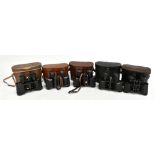 Five pairs of binoculars comprising Noctovist mkII 8x30 binoculars, a pair Raylite 8x30