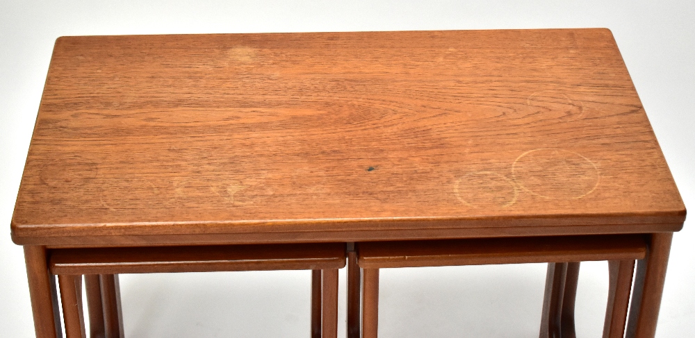 A mid-century teak nest of three occasional tables, the larger rectangular table with a swivel - Image 2 of 5