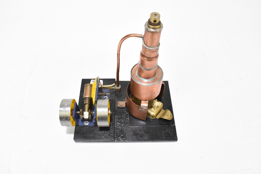 A contemporary scratch built steam engine, with copper chimney, raised on a black painted wooden - Image 2 of 4