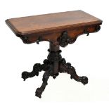 An early Victorian rosewood card table, the rectangular top with a moulded edge above a serpentine