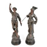 A pair of bronze spelter figures 'Pecheure and Pecheuse', each raised on turned wooden plinth bases,