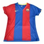 RONALDINHO (Ronaldo de Assis Moreira); a Nike FC Barcelona child’s home shirt signed with ‘