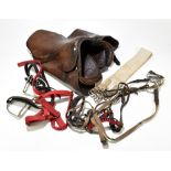A vintage leather horse saddle, length approx 44cm, and further riding accessories including a