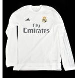 CRISTIANO RONALDO; an Adidas C. F. Real Madrid long-sleeved home shirt signed with ‘Ronaldo 7’ to