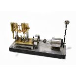 A contemporary scratch built steam engine of rectangular form, raised on a black painted plinth